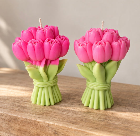 Two pink tulip bunch candles with green stems by Missy Sol