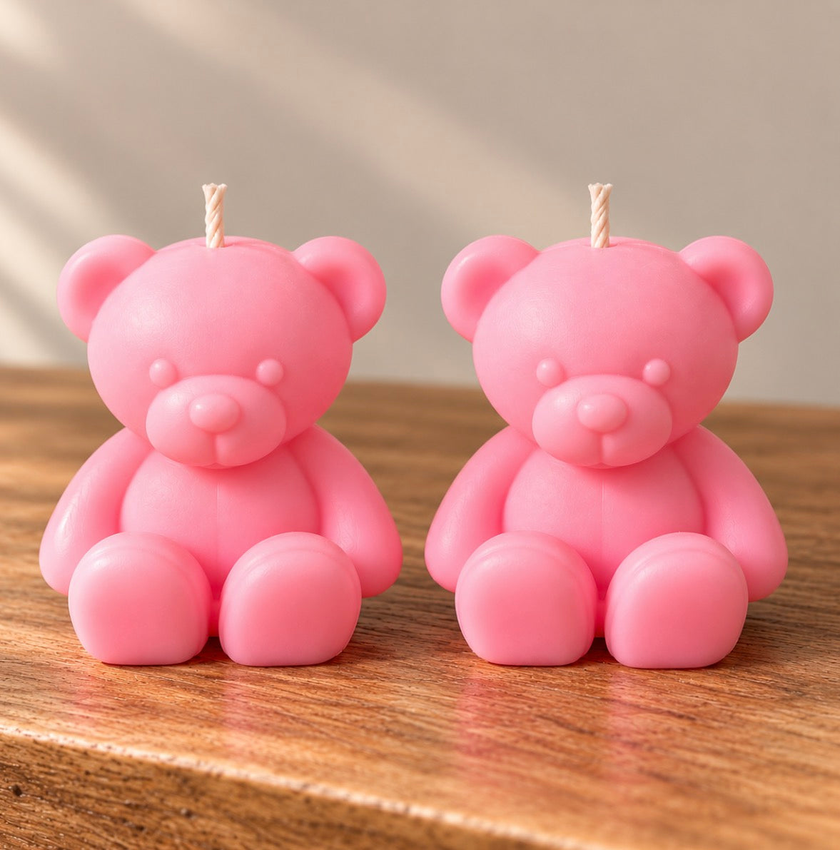 Two smooth blush pink teddy bear candles by Missy Sol