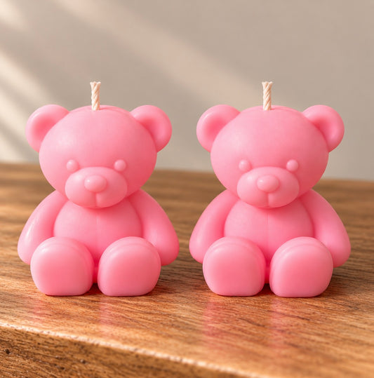 Two smooth blush pink teddy bear candles by Missy Sol