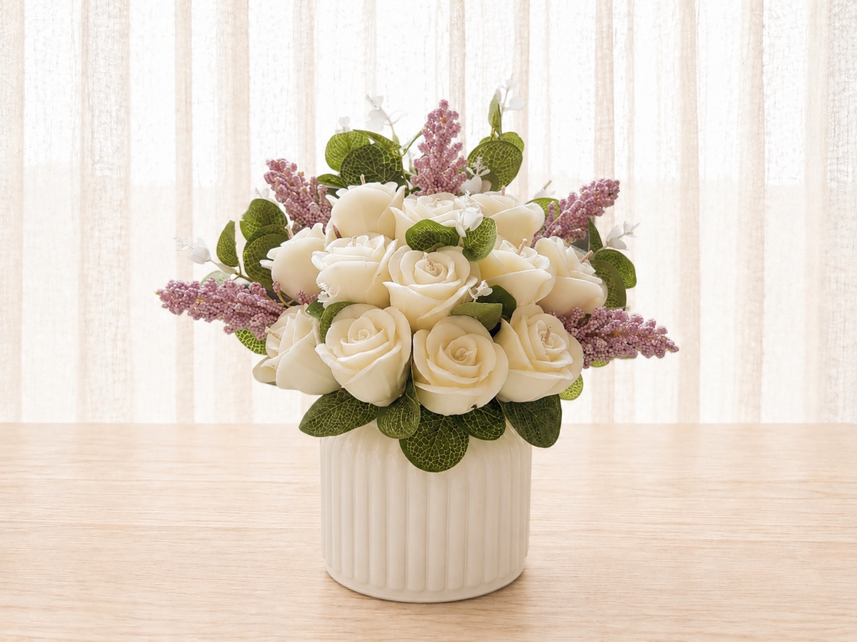 White wax roses with lavender in a ribbed ceramic pot by Missy Sol
