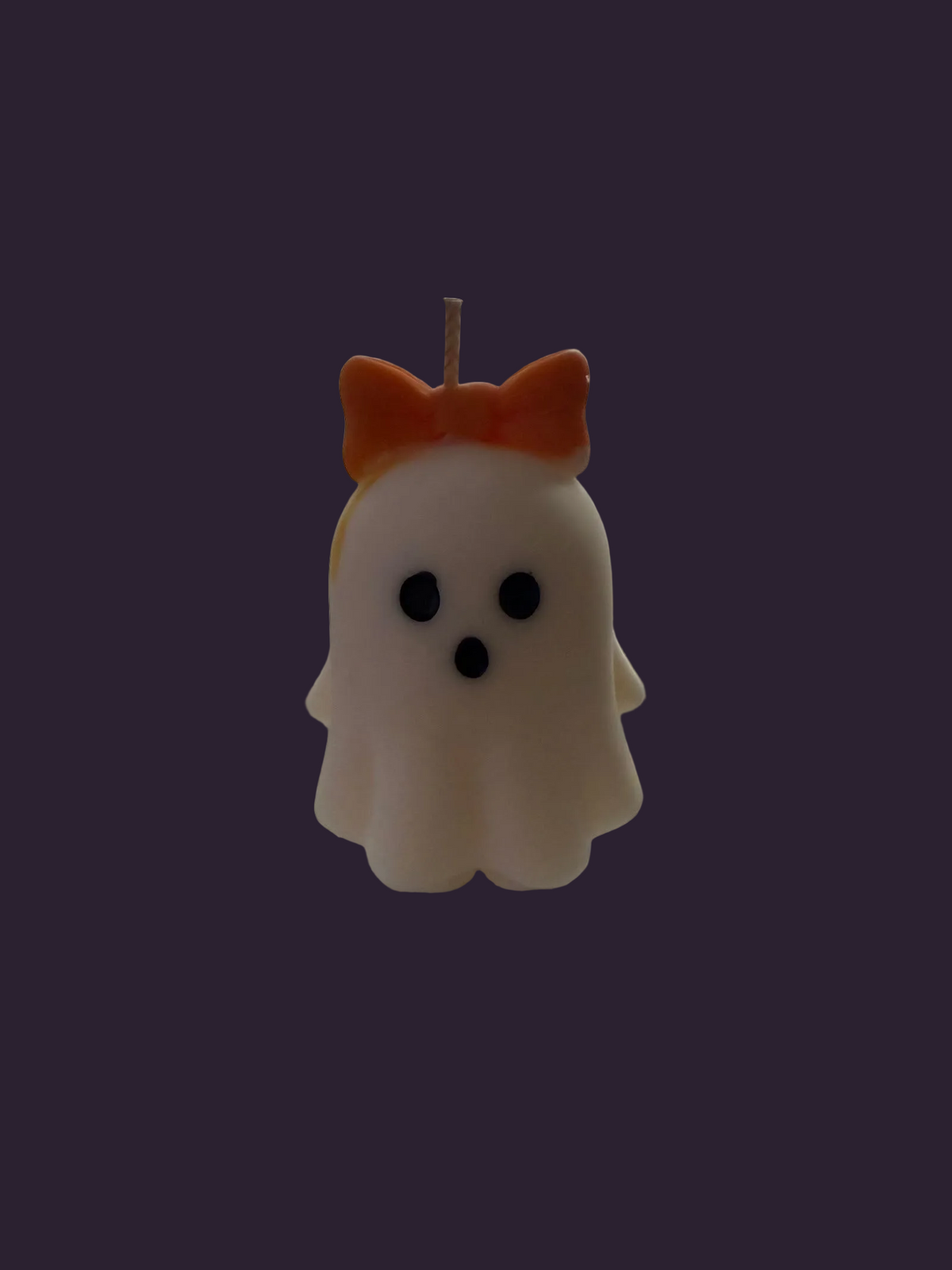 Ghost with an orange bow, hand-poured soy candle by Missy Sol, caramelised toffee apple scent
